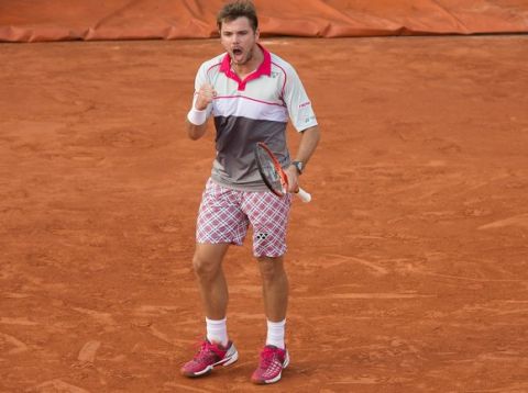Jun 2, 2015; Paris, France; Stan Wawrinka (SUI) reacts during his match against Roger Federer (SUI) on day 10 at Roland Garros. Mandatory Credit: Susan Mullane-USA TODAY Sports