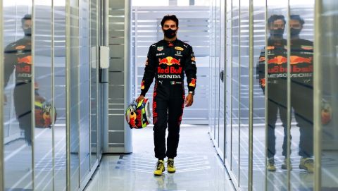 BAHRAIN, BAHRAIN - MARCH 11: Sergio Perez of Mexico and Red Bull Racing walks in the garage during previews ahead of Formula 1 Testing at Bahrain International Circuit on March 11, 2021 in Bahrain, Bahrain. (Photo by Mark Thompson/Getty Images)