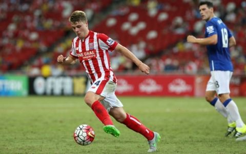 SINGAPORE - JULY 15:  Oliver Shenton of Stoke City dribbles the ball during the Barclays Asia Trophy match between Everton and Stoke City at National Stadium on July 15, 2015 in Singapore.  (Photo by Lionel Ng/Getty Images)