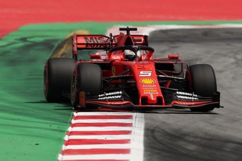 Ferrari driver Sebastian Vettel of Germany steers his car during the qualifying session at the Barcelona Catalunya racetrack in Montmelo, just outside Barcelona, Spain, Saturday, May 11, 2019. The Formula One race will take place on Sunday. (AP Photo/Manu Fernandez)