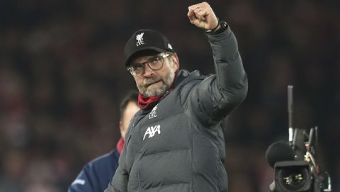 Liverpool's manager Jurgen Klopp celebrates at the end of the English Premier League soccer match between Liverpool and Manchester City at Anfield stadium in Liverpool, England, Sunday, Nov. 10, 2019. Liverpool won 3-1. (AP Photo/Jon Super)
