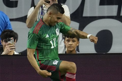 Mexico's Orbelín Pineda (17) celebrates after scoring a goal against Honduras during the second half of a CONCACAF Gold Cup soccer match Sunday, June 25, 2023, in Houston. (AP Photo/David J. Phillip)