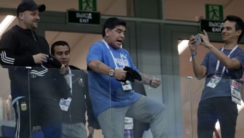Argentina's former soccer star Diego Maradona cheers for his team before the group D match between Argentina and Croatia at the 2018 soccer World Cup in Nizhny Novgorod Stadium in Nizhny Novgorod, Russia, Thursday, June 21, 2018. (AP Photo/Petr David Josek)