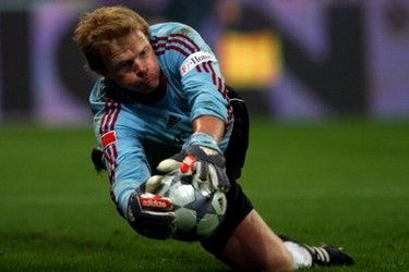 MUNICH, GERMANY - SEPTEMBER 02:  Oliver Kahn in catches the ball during the Oliver Kahn farewell match between FC Bayern Muenchen and Germany at the Allianz Arena on September 2, 2008 in Munich, Germany.  (Photo by Lars Baron/Bongarts/Getty Images)