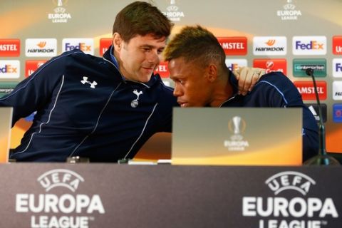 MONACO - SEPTEMBER 30:  Clinton Njie of Spurs and Mauricio Pochettino, coach of Spurs talk during Tottenham Hotspur FC training and press conference at Stade Louis II on September 30, 2015 in Monaco, Monaco.  (Photo by Julian Finney/Getty Images)