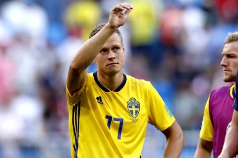 Sweden's Viktor Claesson waves funs at the end of the quarterfinal match between Sweden and England at the 2018 soccer World Cup in the Samara Arena, in Samara, Russia, Saturday, July 7, 2018. England won 2-0. (AP Photo/Alastair Grant)