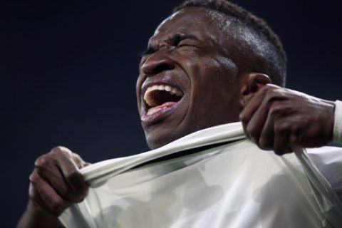 The injured Real forward Vinicius Junior reacts during the Champions League round of 16 second leg soccer match soccer match between Real Madrid and Ajax at the Santiago Bernabeu stadium in Madrid, Tuesday, March 5, 2019. (AP Photo/Bernat Armangue)