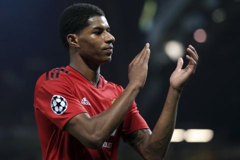 ManU forward Marcus Rashford claps at the end of the Champions League group H soccer match between Manchester United and Young Boys at Old Trafford Stadium in Manchester, England, Tuesday Nov. 27, 2018. (AP Photo/Jon Super)