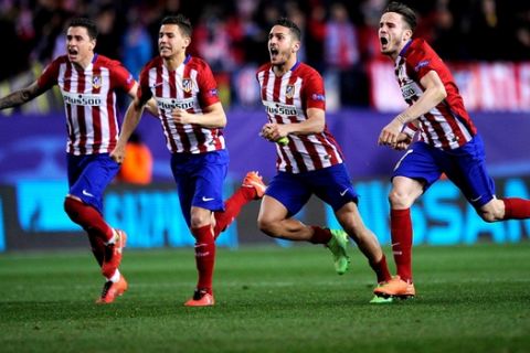 "MADRID, SPAIN - MARCH 15:  Club Atletico de Madrid players celebrate after they won an extra time penalty shoot-out during the  UEFA Champions League round of 16 second leg match between Club Atletico de Madrid and PSV Eindhoven at Vincente Calderon on March 15, 2016 in Madrid, Spain.  (Photo by Denis Doyle - UEFA/UEFA via Getty Images)"