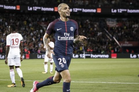 PSG's Layvin Kurzawa celebrates after scoring against Toulouse during the French League One soccer match between PSG and Toulouse at the Parc des Princes stadium in Paris, France, Sunday, Aug. 20, 2017. (AP Photo/Kamil Zihnioglu)