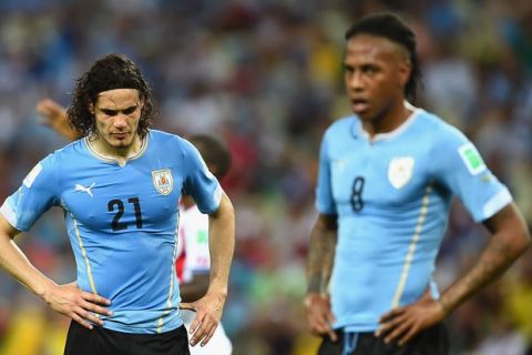 FORTALEZA, BRAZIL - JUNE 14: A dejected Edinson Cavani of Uruguay looks down during the 2014 FIFA World Cup Brazil Group D match between Uruguay and Costa Rica at Castelao on June 14, 2014 in Fortaleza, Brazil.  (Photo by Laurence Griffiths/Getty Images)