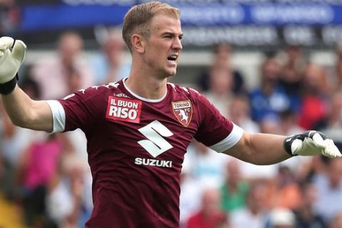 Torino goalkeeper Joe Hart shouts during the Serie A soccer match between Atalanta and Torino, in Bergamo, Italy, Sunday, Sept. 11, 2016. On loan from Manchester City, Hart became the first English goalkeeper to play in Serie A since the league's inception in 1929. (Paolo Magni/ANSA via AP)