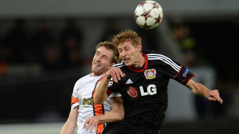Leverkusen's striker Stefan Kiessling (R) and Shakhtar´s defender Olexandr Kucher (L) vie for the ball  during the UEFA Champions League group A match between German first division Bundesliga football club Bayer Leverkusen and the Ukrainian football club Shakhtar Donezk at the BayArena in Leverkusen, western Germany, on October 23, 2013. AFP PHOTO / PATRIK STOLLARZ        (Photo credit should read PATRIK STOLLARZ/AFP/Getty Images)