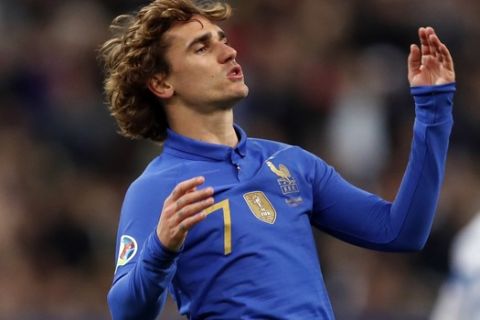 France's Antoine Griezmann reacts after missing a chance to score during the Euro 2020 group H qualifying soccer match between France and Iceland at the Stade de France in Saint Denis, north of Paris, Monday, March 25, 2019. (AP Photo/Christophe Ena)