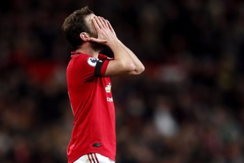 Manchester United's Juan Mata reacts to a missed chance during the English Premier League soccer match between Manchester United and Wolverhampton Wanderers, at Old Trafford, in Manchester, England, Saturday, Feb. 1, 2020. (Martin Rickett/PA via AP)