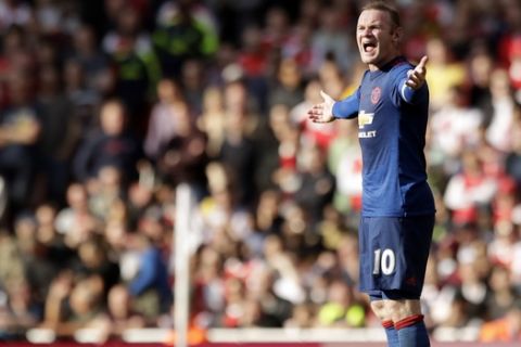 Manchester United's Wayne Rooney gestures during the English Premier League soccer match between Arsenal and Manchester United at the Emirates stadium in London, Sunday, May 7, 2017. (AP Photo/Matt Dunham)