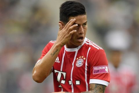 Bayern's James Rodriguez reacts on the pitch during the Telekom Cup soccer final between Bayern Munich and Werder Bremen at the Borussia Park in Moenchengladbach, Saturday, July 15, 2017. Bayern defeated Bremen with 2-0. (AP Photo/Martin Meissner)