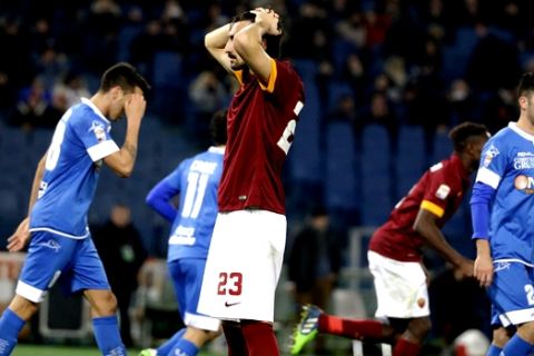 Roma's Davide Astori reacts after missing  a scoring chance during a Serie A soccer match between Roma and Empoli, at Rome's Olympic Stadium, Saturday, Jan. 31, 2015. (AP Photo/Andrew Medichini)