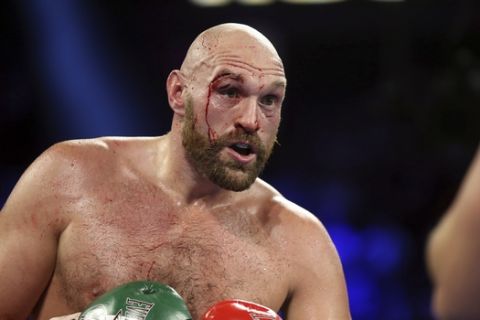 Tyson Fury, of England, displays a cut over his right eye following a heavyweight boxing match against Otto Wallin, of Sweden, Saturday, Sept. 14, 2019, in Las Vegas. Fury won by unanimous decision. (AP Photo/Isaac Brekken)