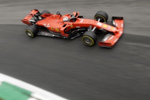 Ferrari driver Sebastian Vettel of Germany steers his car during the first free practice at the Monza racetrack, in Monza, Italy, Friday, Sept. 6, 2019. The Formula one race will be held on Sunday. (AP Photo/Luca Bruno)