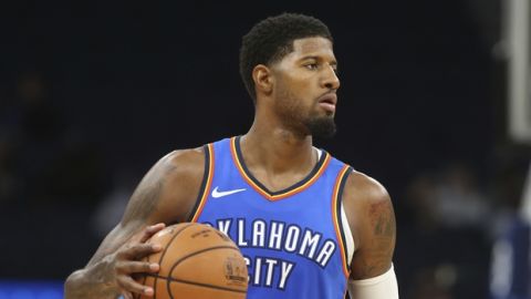 Oklahoma City Thunder's Paul George plays against the Minnesota Timberwolves in the first half of an NBA preseason basketball game Friday, Oct. 5, 2018, in Minneapolis. (AP Photo/Jim Mone)