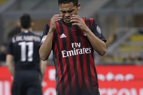 AC Milan's Carlos Bacca reacts after missing a penalty during a Serie A soccer match between AC Milan and Chievo Verona, at the San Siro stadium in Milan, Italy, Saturday, March 4, 2017. (AP Photo/Luca Bruno)