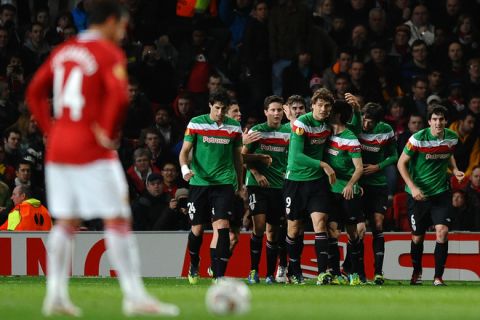 Athletic Bilbao's Spanish forward Fernando Llorente (4R) celebrates after scoring during the UEFA Europa League round of 16 first leg football match between Manchester United and Athletico Bilbao at Old Trafford in Manchester, north-west England on March 8, 2012.    AFP PHOTO/ PAUL ELLIS (Photo credit should read PAUL ELLIS/AFP/Getty Images)