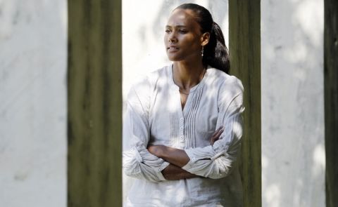In this photo made Oct. 13, 2010, Marion Jones poses in Austin, Texas. In an interview with The Associated Press, former Olympic track star Marion Jones discusses her time in prison and her new book. (AP Photo/Eric Gay)