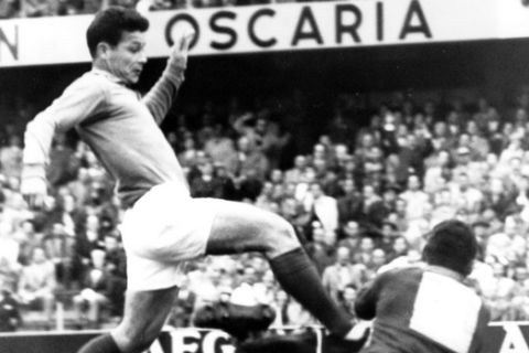 FILE - This is a June 24, 1958  file photo of France's Just Fontaine, left, as he tries to go past  Brazil's goalkeeper Gilmar tackles in their semifinal match in Stockholm. With one week to go before the World Cup starts in Brazil, The Associated Press takes a look at 10 great stars in the tournament's history. Fontaine holds a record that is unlikely to be broken anytime soon: scoring 13 goals in a single World Cup tournament. Fontaine took six games to achieve his feat at the 1958 World Cup, when he was a last-minute inclusion on the French squad. The closest anyone has come was Gerd Mueller's 10 goals for West Germany in 1970. Entering the 1958 World Cup in Sweden, the Moroccan-born Fontaine was a little-known forward outside of the French league. Yet he tormented opponents with his speed and finishing touch _ and even with someone else's boots. He had to borrow a pair after damaging his own boots in practice. (AP Photo/Reportagebild, Pool, File)