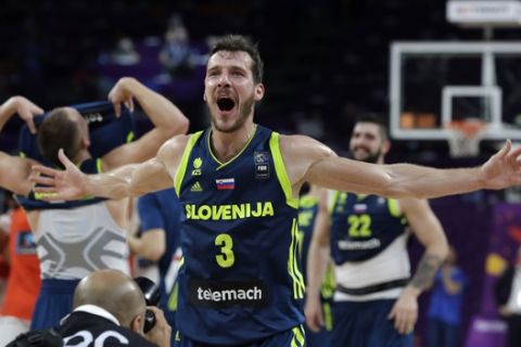 Slovenia's Goran Dragic celebrates at the end of their Eurobasket European Basketball Championship semifinal match against Spain in Istanbul, Thursday, Sept. 14, 2017. Slovenia won 92-72. (AP Photo/Thanassis Stavrakis)