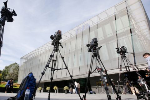 TV cameras stand outside the FIFA headquarters after a meeting of the FIFA Executive Committee in Zurich, Switzerland, Friday, Sept. 25, 2015. FIFA canceled a news conference scheduled with President Sepp Blatter without explanation, fueling the sense of turmoil surrounding footballs embattled governing body. (AP Photo/Michael Probst)