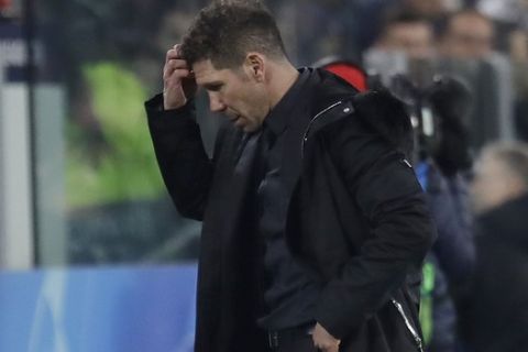 Atletico coach Diego Simeone reacts during the Champions League round of 16, 2nd leg, soccer match between Juventus and Atletico Madrid at the Allianz stadium in Turin, Italy, Tuesday, March 12, 2019. (AP Photo/Luca Bruno)