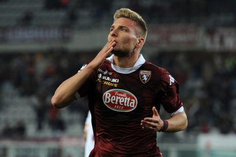 TURIN, ITALY - MARCH 22:  Ciro Immobile of Torino FC celebrates after scoring the opening goal during the Serie A match between Torino FC and AS Livorno Calcio at Stadio Olimpico di Torino on March 22, 2014 in Turin, Italy.  (Photo by Valerio Pennicino/Getty Images)