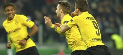 TURIN, ITALY - FEBRUARY 24:  Marco Reus (C) of Borussia Dortmund celebrates his goal with his team-mate Ciro Immobile (R) during the UEFA Champions League Round of 16 match between Juventus and Borussia Dortmund at Juventus Arena on February 24, 2015 in Turin, Italy.  (Photo by Marco Luzzani/Getty Images)