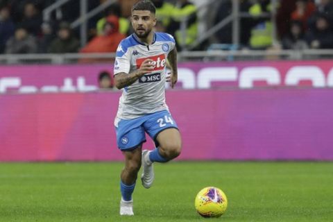 Napoli's Lorenzo Insigne controls the ball during a Serie A soccer match between AC Milan and Napoli, at the San Siro stadium in Milan, Italy, Saturday, Nov. 23, 2019. (AP Photo/Luca Bruno)