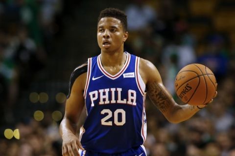 Philadelphia 76ers' Markelle Fultz brings the ball up the court during the second quarter of a preseason NBA basketball game against the Boston Celtics in Boston Monday, Oct. 9, 2017. (AP Photo/Winslow Townson)