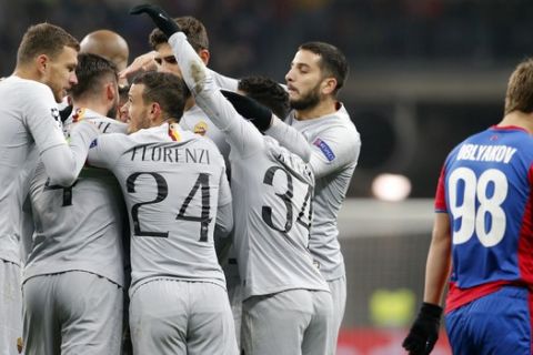 Roma players celebrate their side's second goal during a Group G Champions League soccer match between CSKA Moscow and Roma at the Luzhniki Stadium in Moscow, Wednesday, Nov. 7, 2018. (AP Photo/Alexander Zemlianichenko)