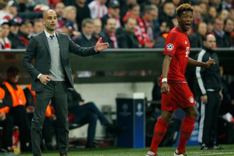 "MUNICH, GERMANY - MAY 03:  Josep Guardiola manager of Bayern Munich and David Alaba of Bayern Munich look on during UEFA Champions League semi final second leg match between FC Bayern Muenchen and Club Atletico de Madrid at Allianz Arena on May 3, 2016 in Munich, Germany.  (Photo by Adam Pretty/Bongarts/Getty Images)"