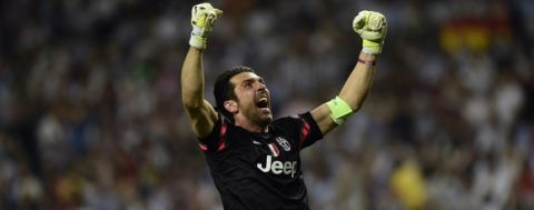 Juventus' goalkeeper and captain Gianluigi Buffon celebrates during the UEFA Champions League semi-final second leg football match Real Madrid FC vs Juventus at the Santiago Bernabeu stadium in Madrid on May 13, 2015.   AFP PHOTO/ JAVIER SORIANO        (Photo credit should read JAVIER SORIANO/AFP/Getty Images)