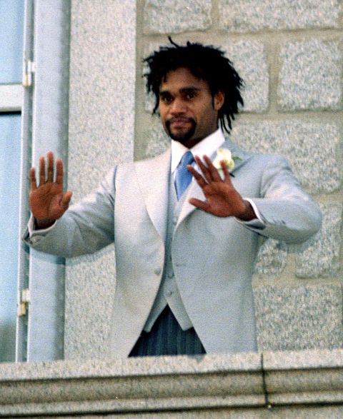 French soccer player Christian Karembeu waves to the crowd from the balcony of the Porto Vecchio townhall, Corsica, after his wedding with Slovak top model Adriana Sklenarikova Tuesday Dec. 22, 1998.  Karembeu was on the World Cup winning French team and now plays with Spanish team Real Madrid. (AP PHOTO/Mediasud)