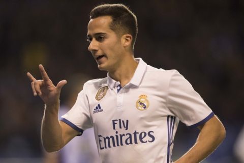 Real Madrid's Lucas Vazquez celebrates after scoring a third goal during a Spanish La Liga soccer match between Deportivo La Coruna and Real Madrid at the Riazor stadium in A Coruna, Spain, Wednesday April 26, 2017. (AP Photo/Lalo R. Villar)