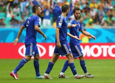 SALVADOR, BRAZIL - JUNE 25:  Miralem Pjanic (R) of Bosnia and Herzegovina celebrates scoring his team's second goal with his teammate Tino Sven Susic (C) and Vedad Ibisevic (L) during the 2014 FIFA World Cup Brazil Group F match between Bosnia-Herzegovina and Iran at Arena Fonte Nova on June 25, 2014 in Salvador, Brazil.  (Photo by Alex Livesey - FIFA/FIFA via Getty Images)