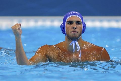 Greece's Ioannis Fountoulis reacts during their men's preliminary round Group A water polo match against Kazakhstan at the London 2012 Olympic Games at the Water Polo Arena August 2, 2012.             REUTERS/Laszlo Balogh (BRITAIN  - Tags: OLYMPICS SPORT WATER POLO)  