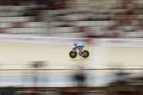 Hong Kong's Tsz Chun during the men's sprint track cycling at the 18th Asian Games in Jakarta, Indonesia, Wednesday, Aug. 29, 2018. (AP Photo/Aaron Favila)