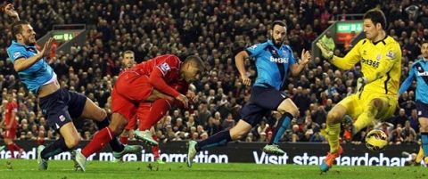 Glen Johnson of Liverpool scores the opening goal of the game