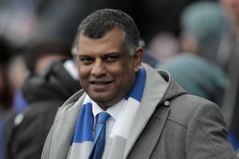 Queens Park Rangers' chairman and Director of Air Aisa Tony Fernandes looks on from the dugout before the start of their English Premier League soccer match against Reading, at Loftus Road stadium, London, Sunday, Nov. 4, 2012. (AP Photo/Sang Tan)