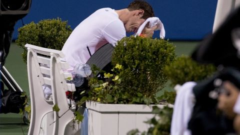 Andy Murray, of Britain, becomes emotional after defeating Marius Copil, of Romania, 6-7(5), 3-6, 7-6(4), during the Citi Open tennis tournament in Washington, Friday, Aug. 3, 2018. (AP Photo/Andrew Harnik)