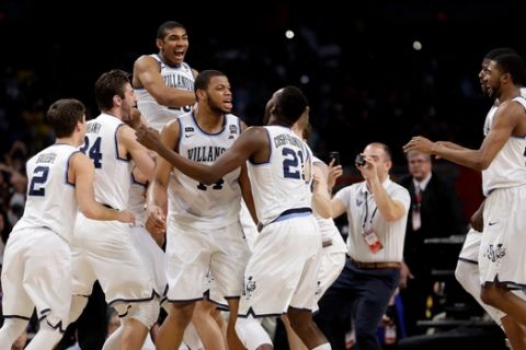 Villanova players celebrate after defeating Michigan 79-62 in the championship game of the Final Four NCAA college basketball tournament, Monday, April 2, 2018, in San Antonio. (AP Photo/Eric Gay)