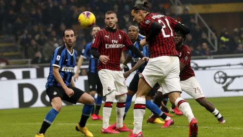 AC Milan's Zlatan Ibrahimovic scores his side's second goal during the Serie A soccer match between Inter Milan and AC Milan at the San Siro Stadium, in Milan, Italy, Sunday, Feb. 9, 2020. (AP Photo/Antonio Calanni)