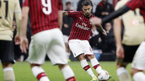 AC Milan's Suso scores his side's opening goal during the Serie A soccer match between AC Milan and Spal at the San Siro stadium, in Milan, Italy, Thursday, Oct. 31, 2019. (AP Photo/Antonio Calanni)